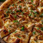 Chicken Pizza with Lots of Cheese and Fresh Herbs